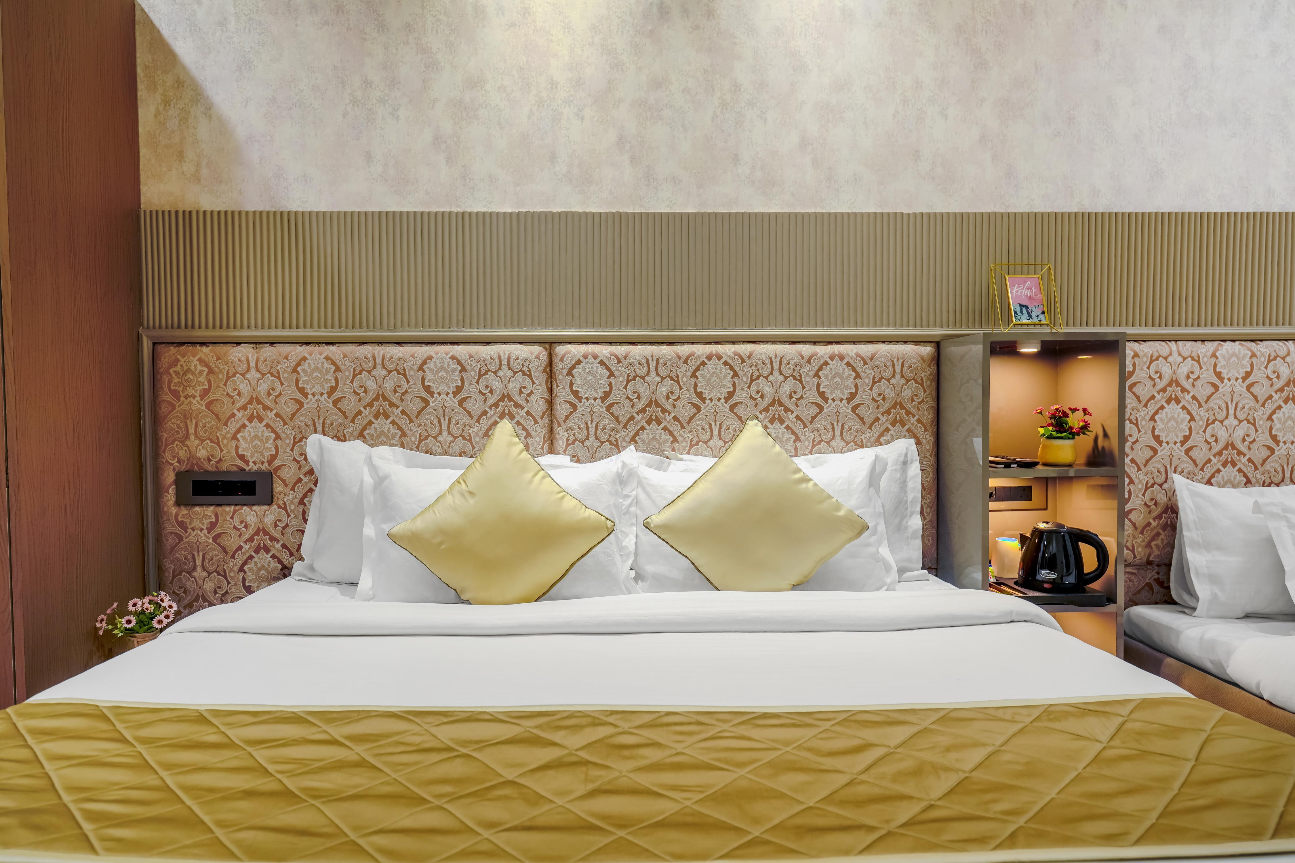 Elegance A Boutique Stay - Tap to explore photos