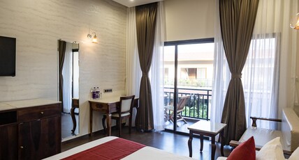 Prana Resorts and Banquets Room Type - Deluxe Room with Balcony and Pool View Prana Resorts and Banquets Room Type - Deluxe Room with Balcony and Pool View