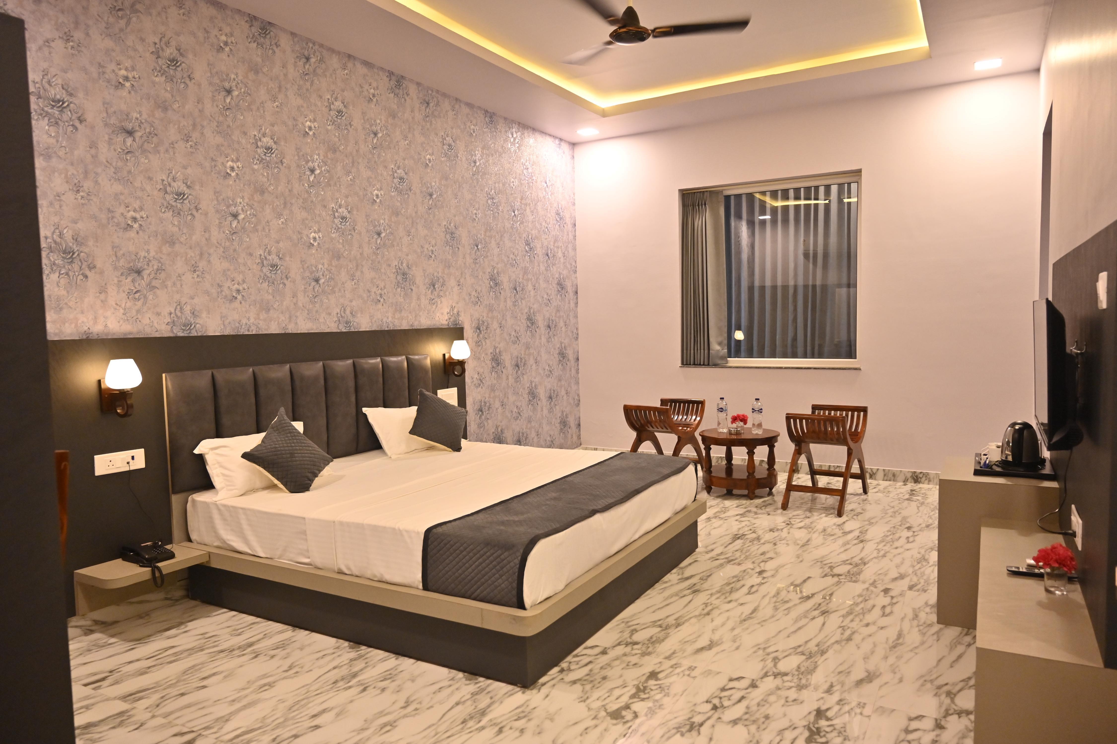 R K HOTEL Room Type - Deluxe Rooms