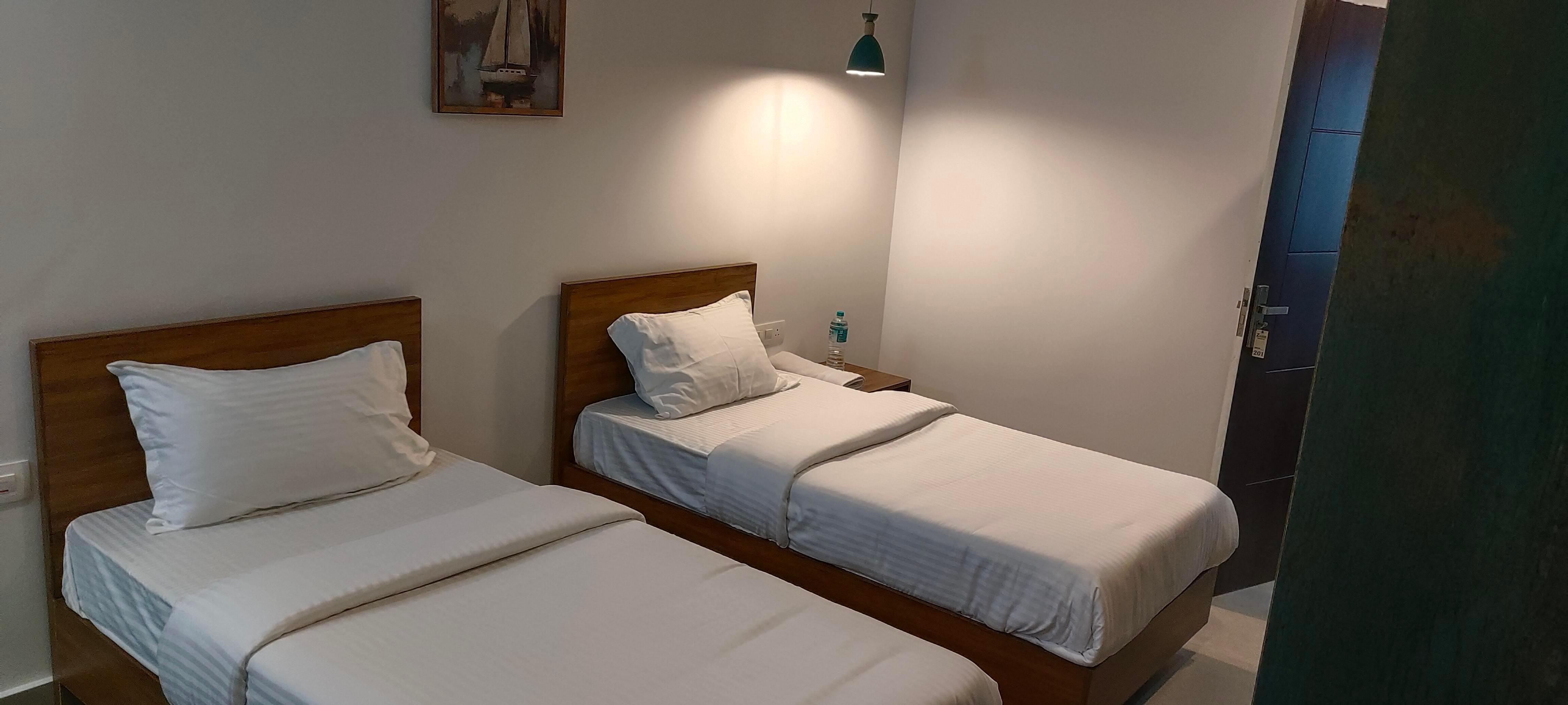 Zahir Residency Calicut Room Type - STANDARD TWIN BED AC ROOM