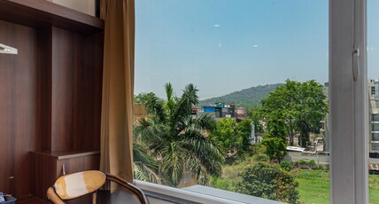 Hotel Purple Dot Haridwar Room Type - Deluxe Room with City View Hotel Purple Dot Haridwar Room Type - Deluxe Room with City View