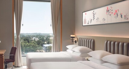 Ramada by Wyndham Ranchi Room Type - 2 Queen Beds, Deluxe Family Room