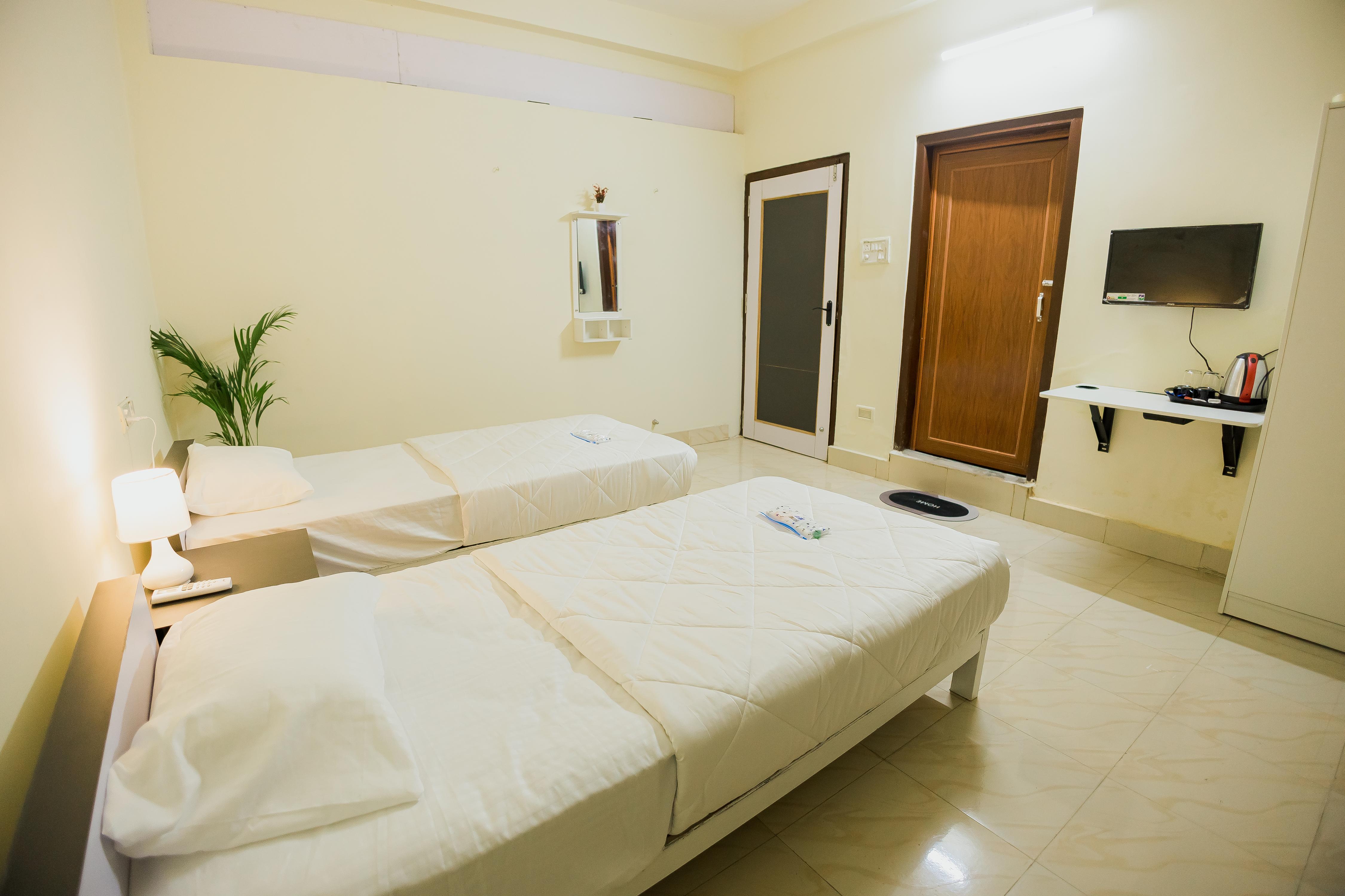 Phagun Suites Homestay - Tap to explore photos