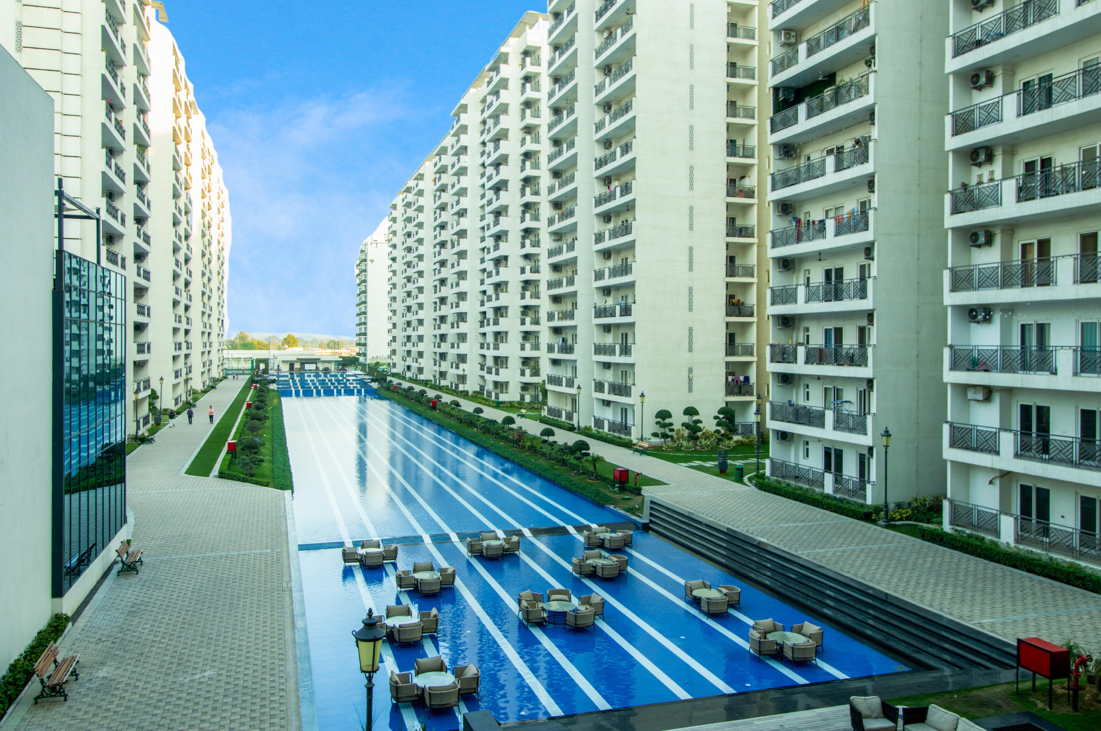 Central Park 2BR Apt Near Gurugram Wid pool Access - Tap to explore photos