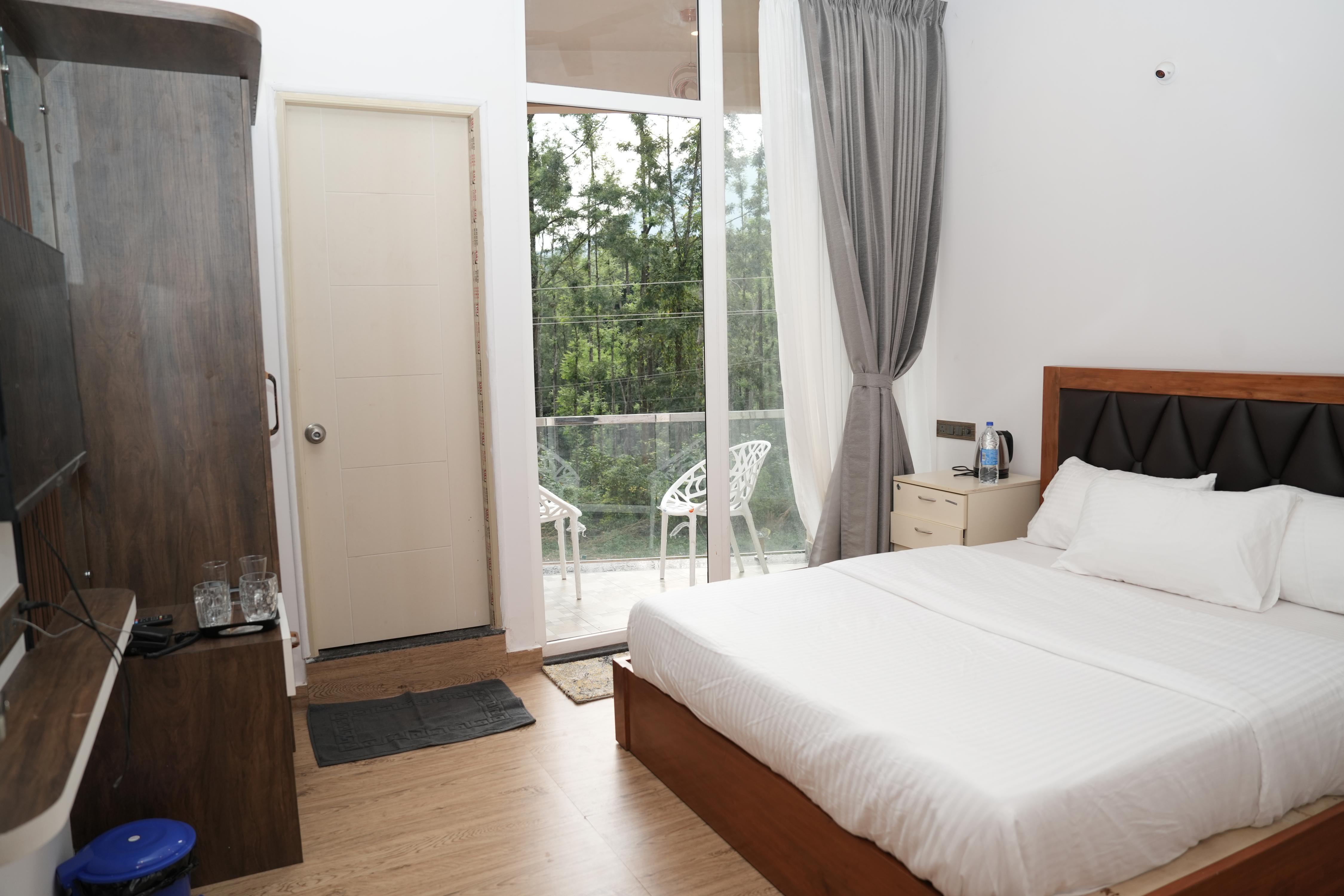 Pallakki comforts Room Type - Queen Bed Room with Hill View, First/Second Floor Non AC