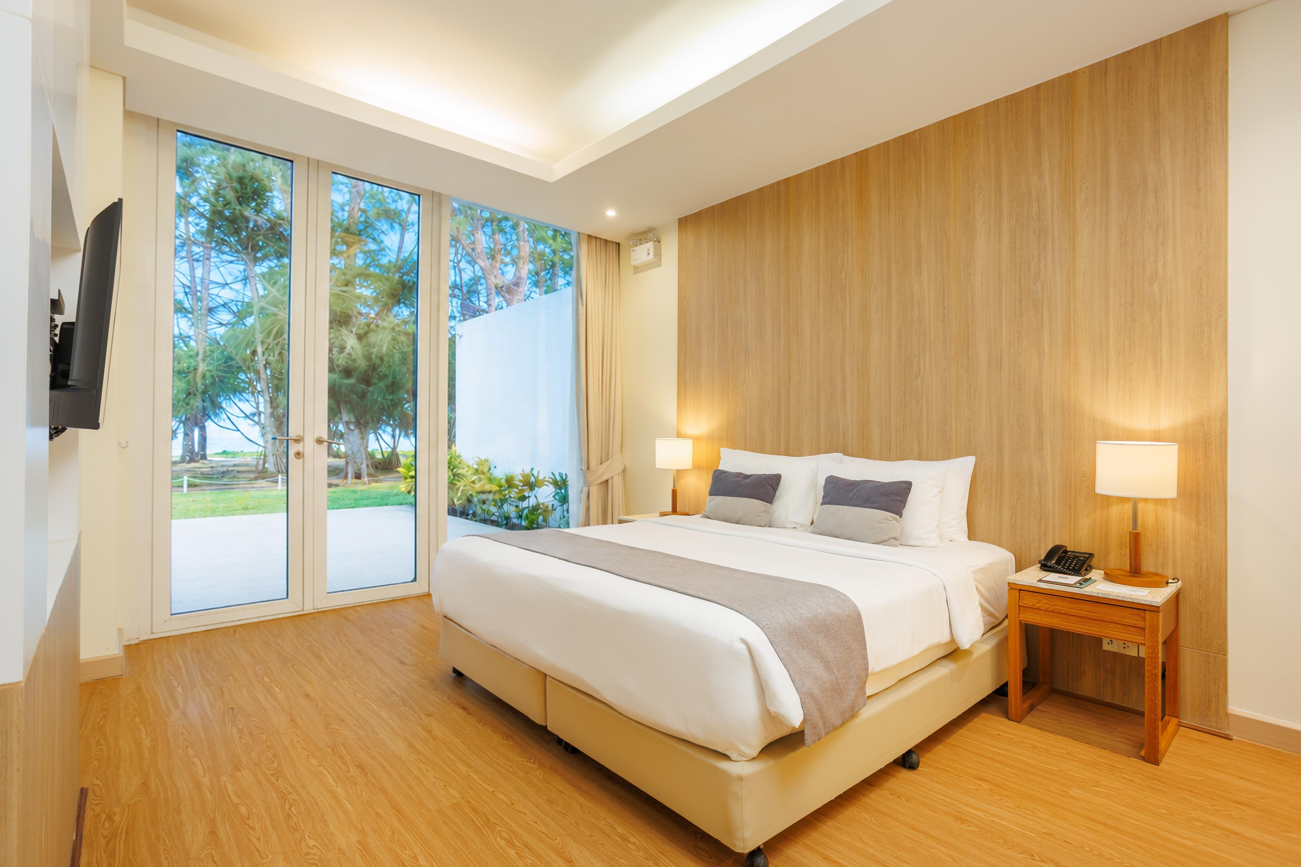 Andaman Pool Villas, Maikhao Phuket - Tap to explore photos