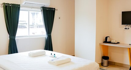 Global Inn Suites Room Type - Deluxe AC Room