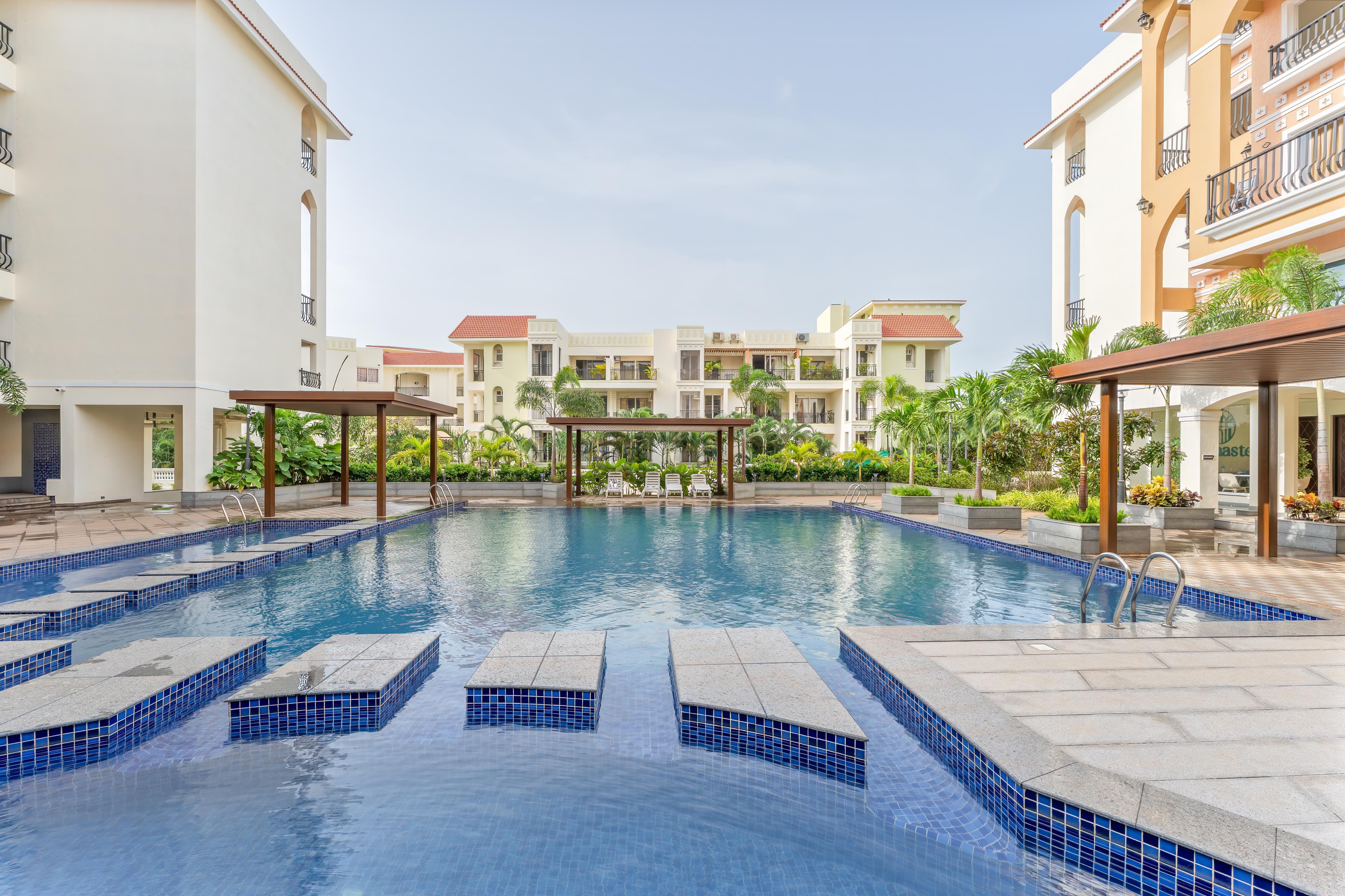 Sereno Azura 1 bhk pool view w / game zone, jacuzzi - Tap to explore photos