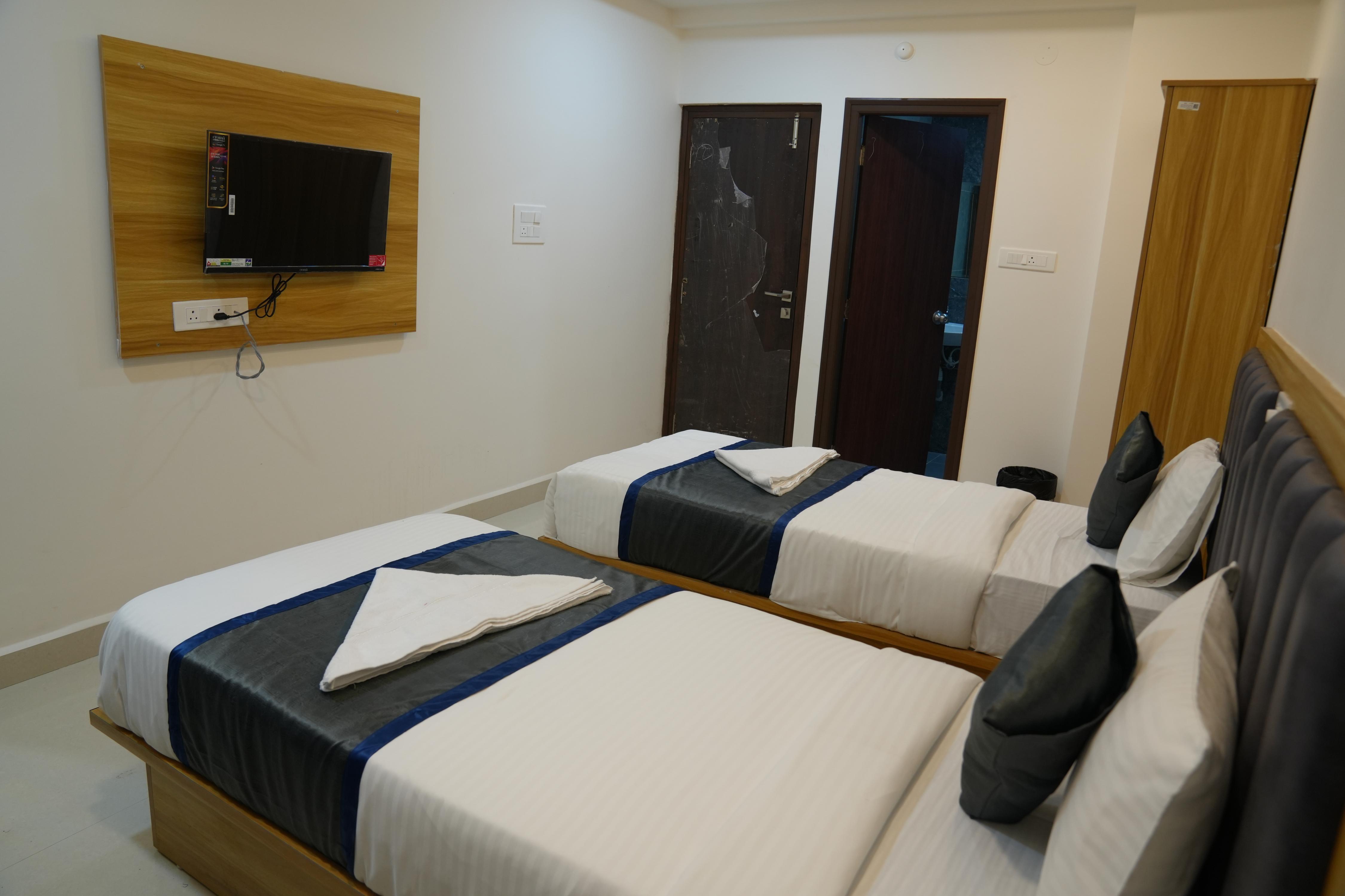 Hotel Vamshi Elite - Tap to explore photos