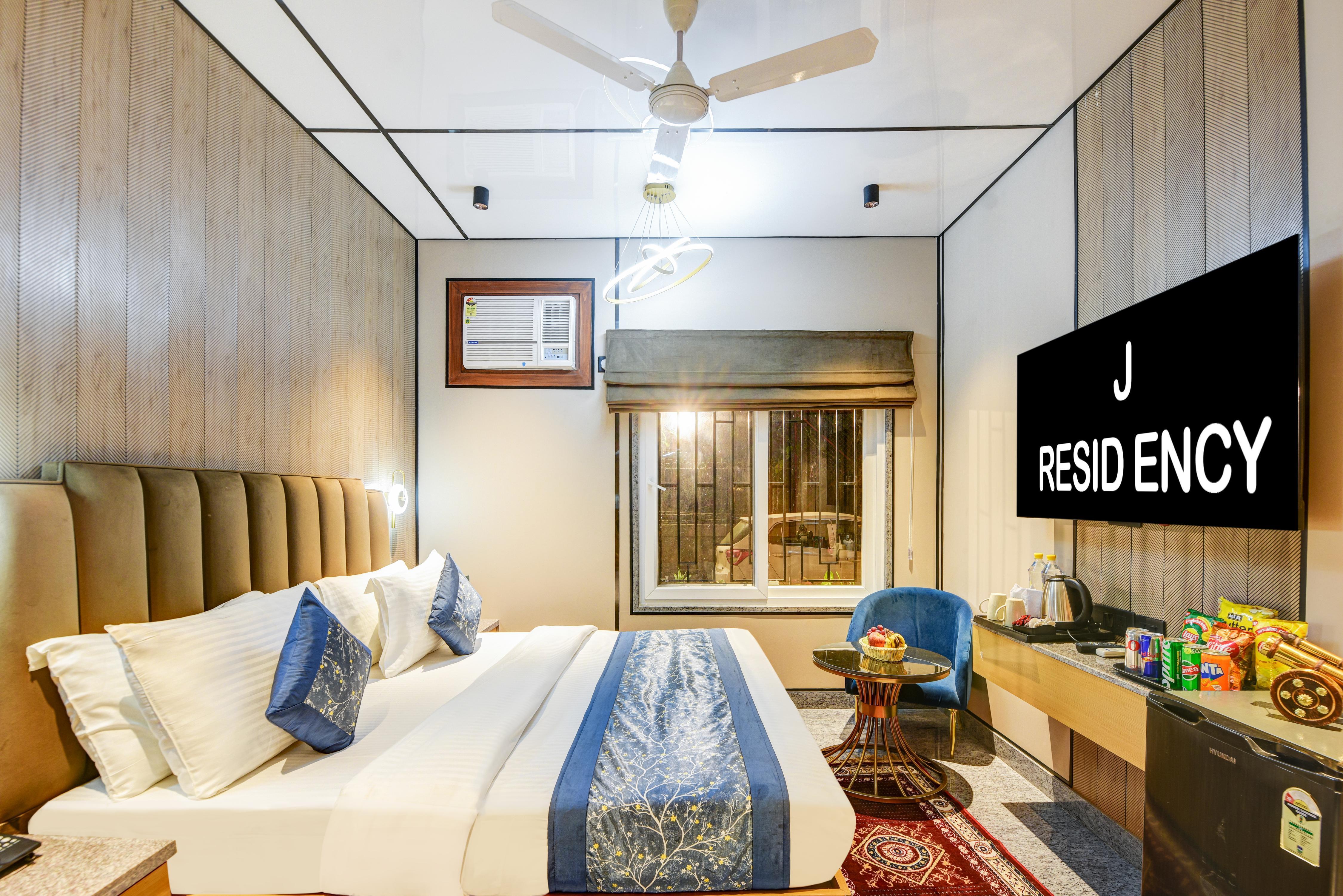 J Residency Near Nizamuddin Railway Station by TRIINDIA Hospitality - Tap to explore photos