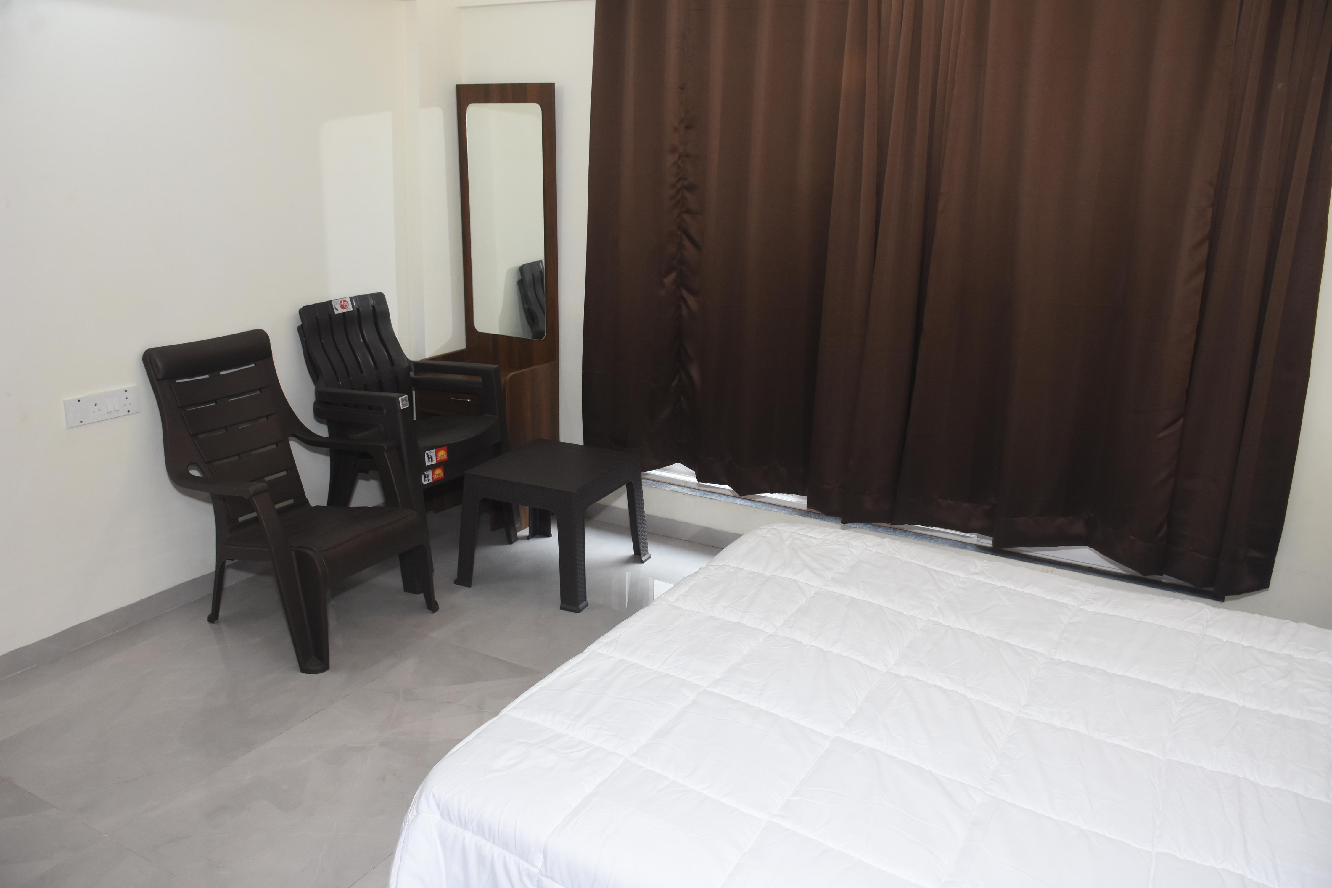 Aura One by Nikhat Hospitality (1BHK) - Tap to explore photos
