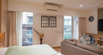 Luxora Stays | Beside Airport | Entire Apartments Room Type - B104|Airport view from roof|55 inch TV|Coffee maker