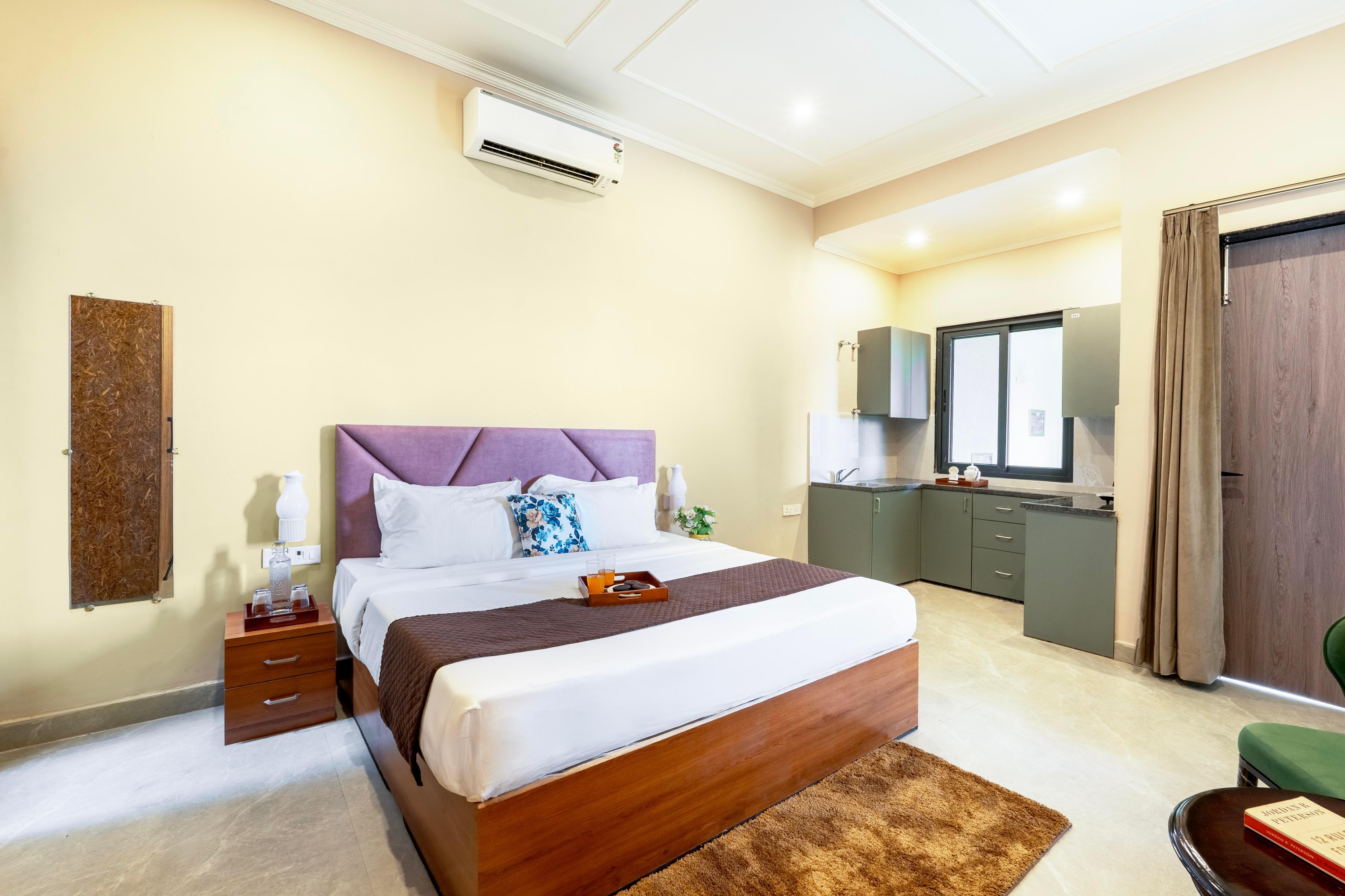 SaffronStays Aaramya Dham Room Type - Bedroom 1