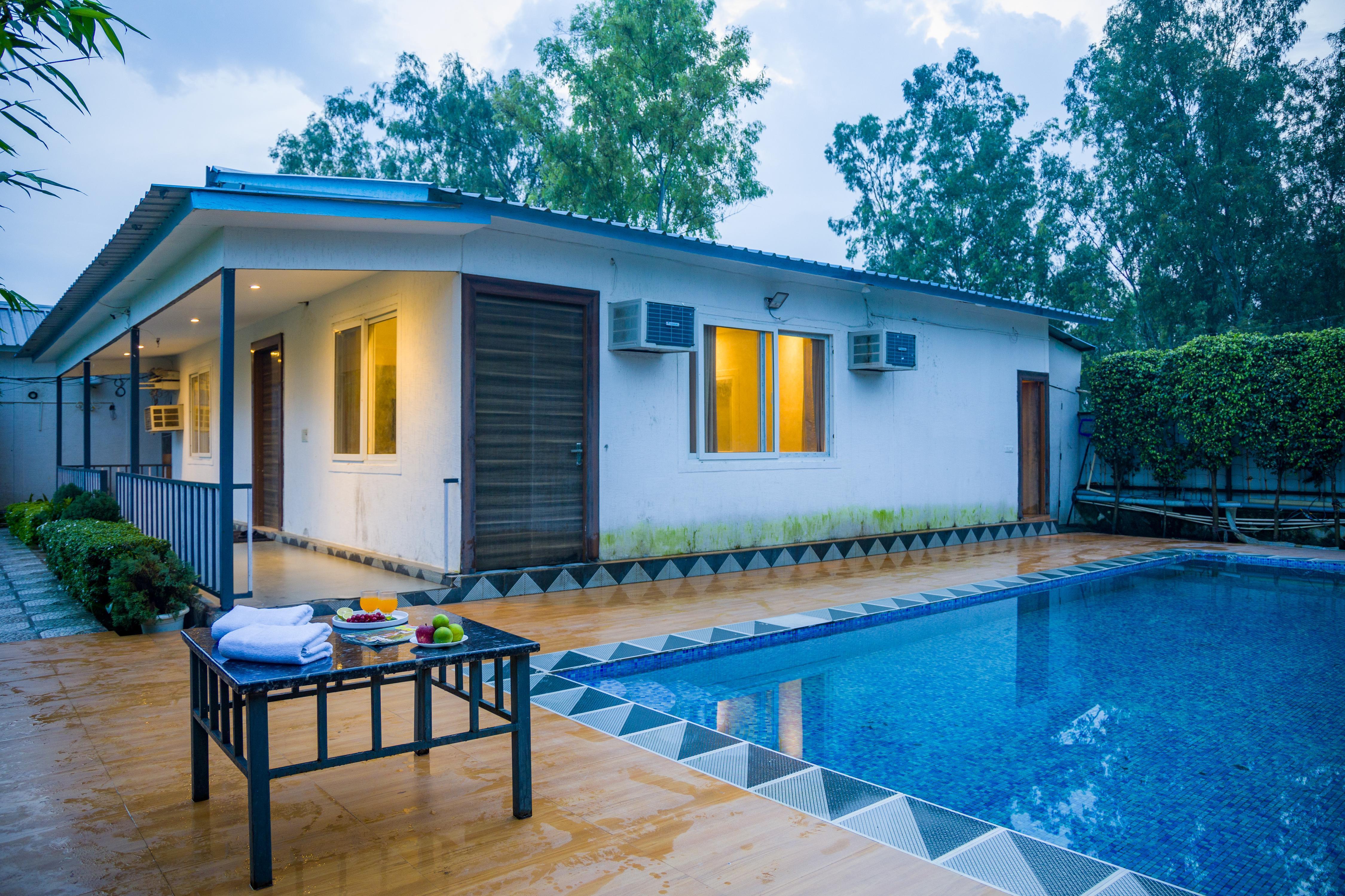 Alaya Stays Krishna Manor Pet friendly 3 BHK Farmhouse With Private Pool - Tap to explore photos
