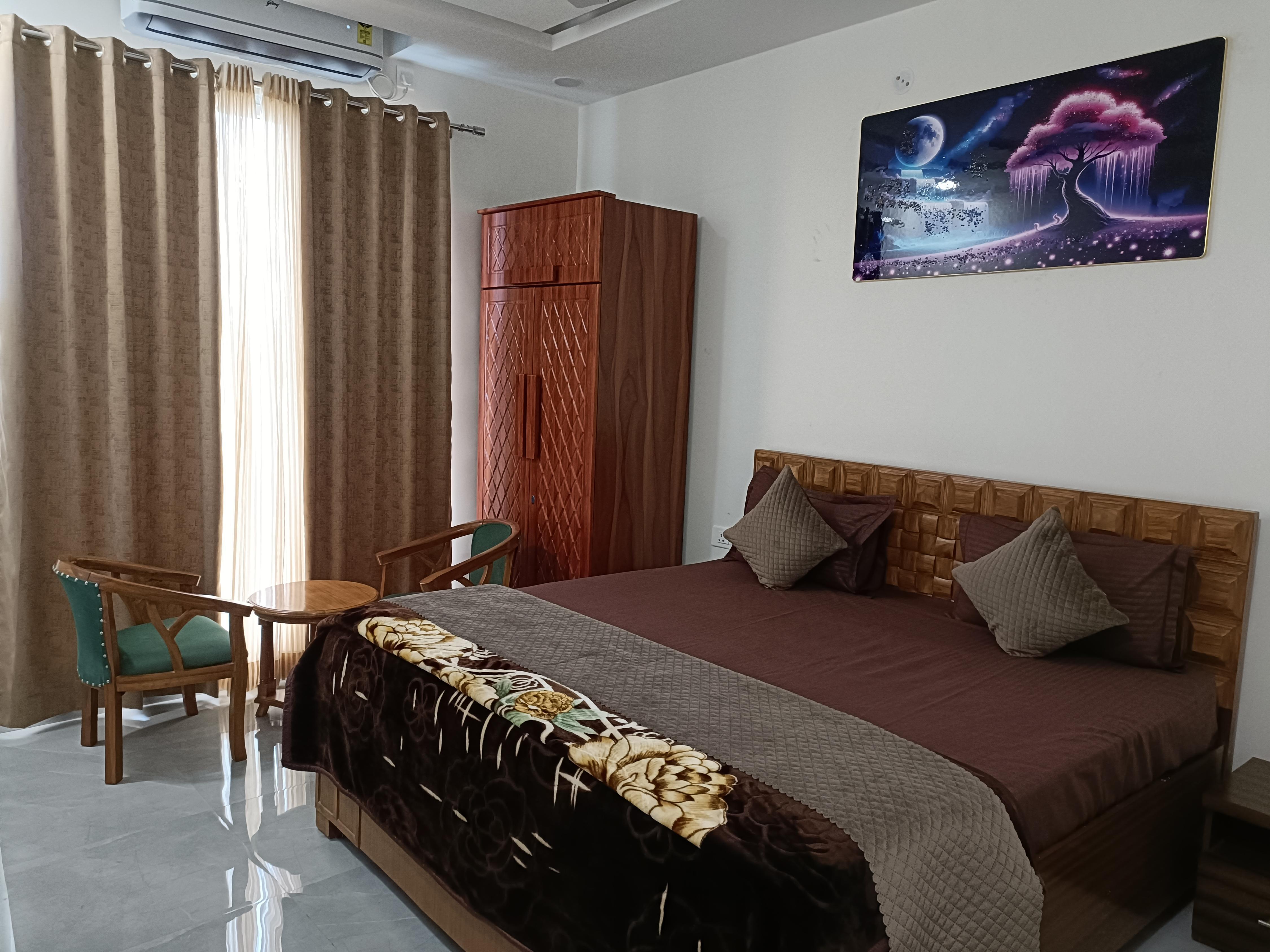 AADHYA HOTEL & ADHIRA RESTAURANT Room Type - Deluxe King Bed with City View