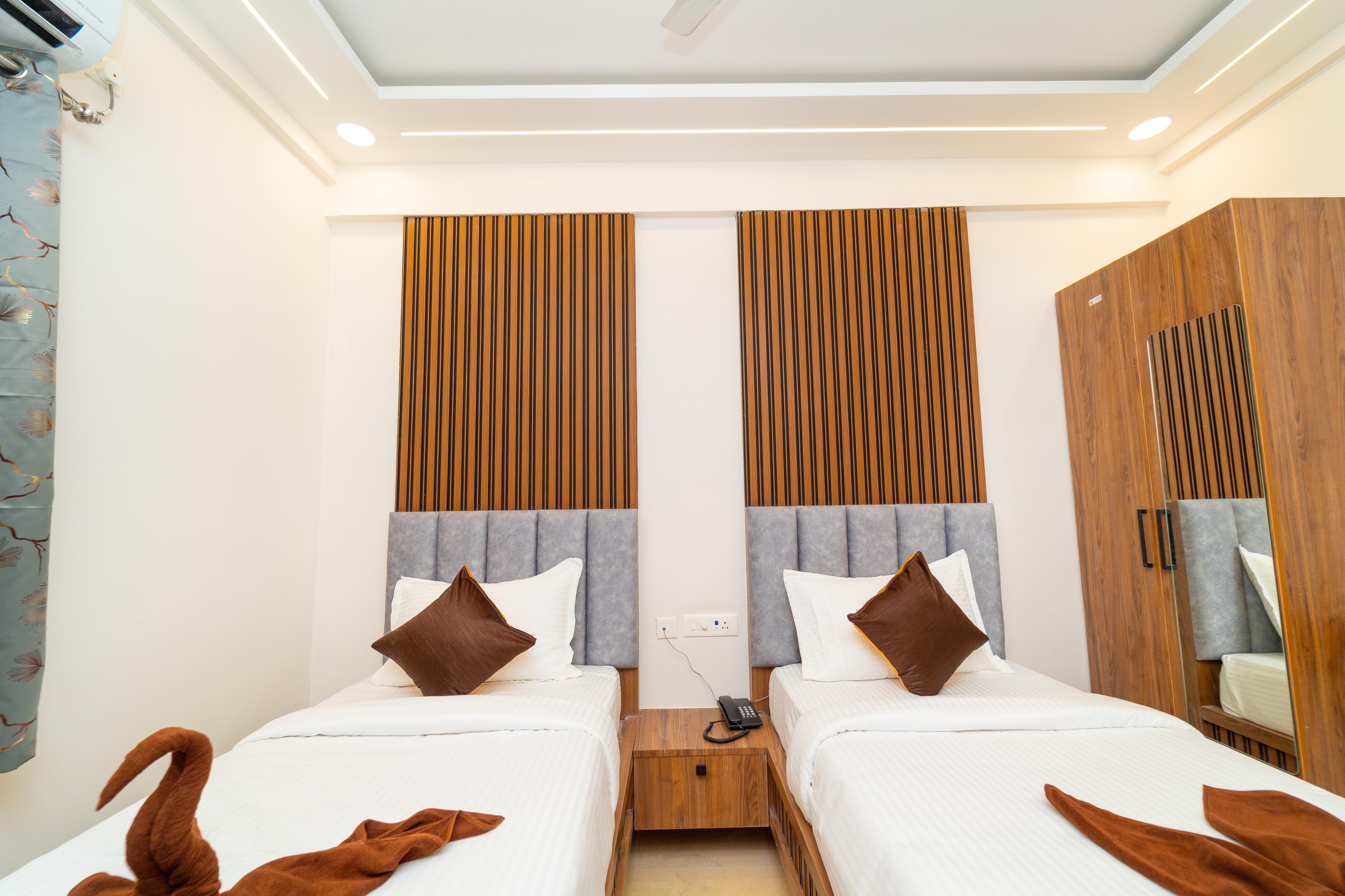 MATHI RESIDENCY Room Type - DELUXE TWIN BED