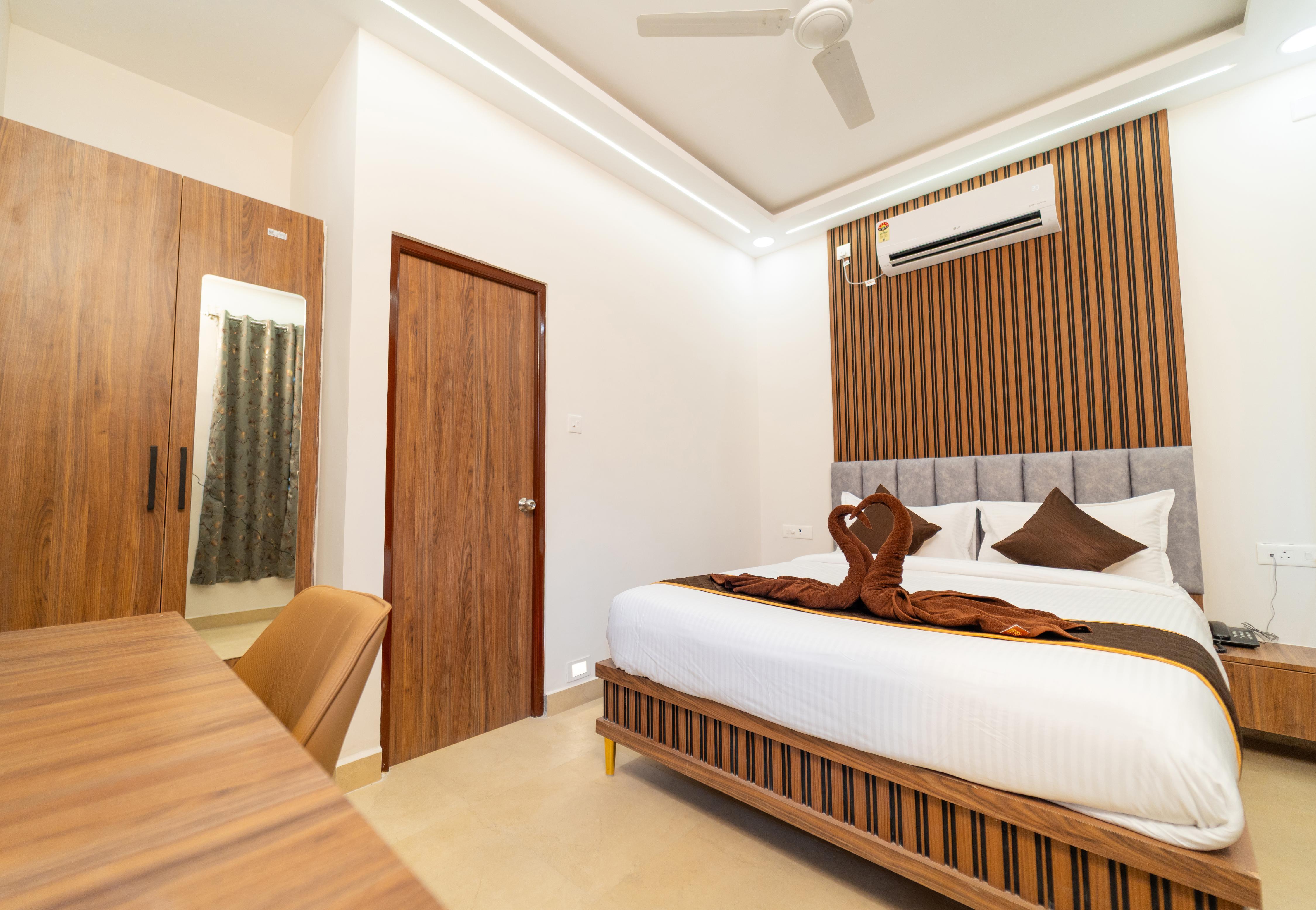 MATHI RESIDENCY Room Type - Deluxe Room