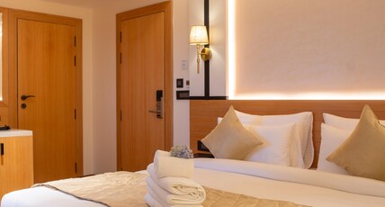 Evara Heights Room Type - Deluxe Room with Balcony