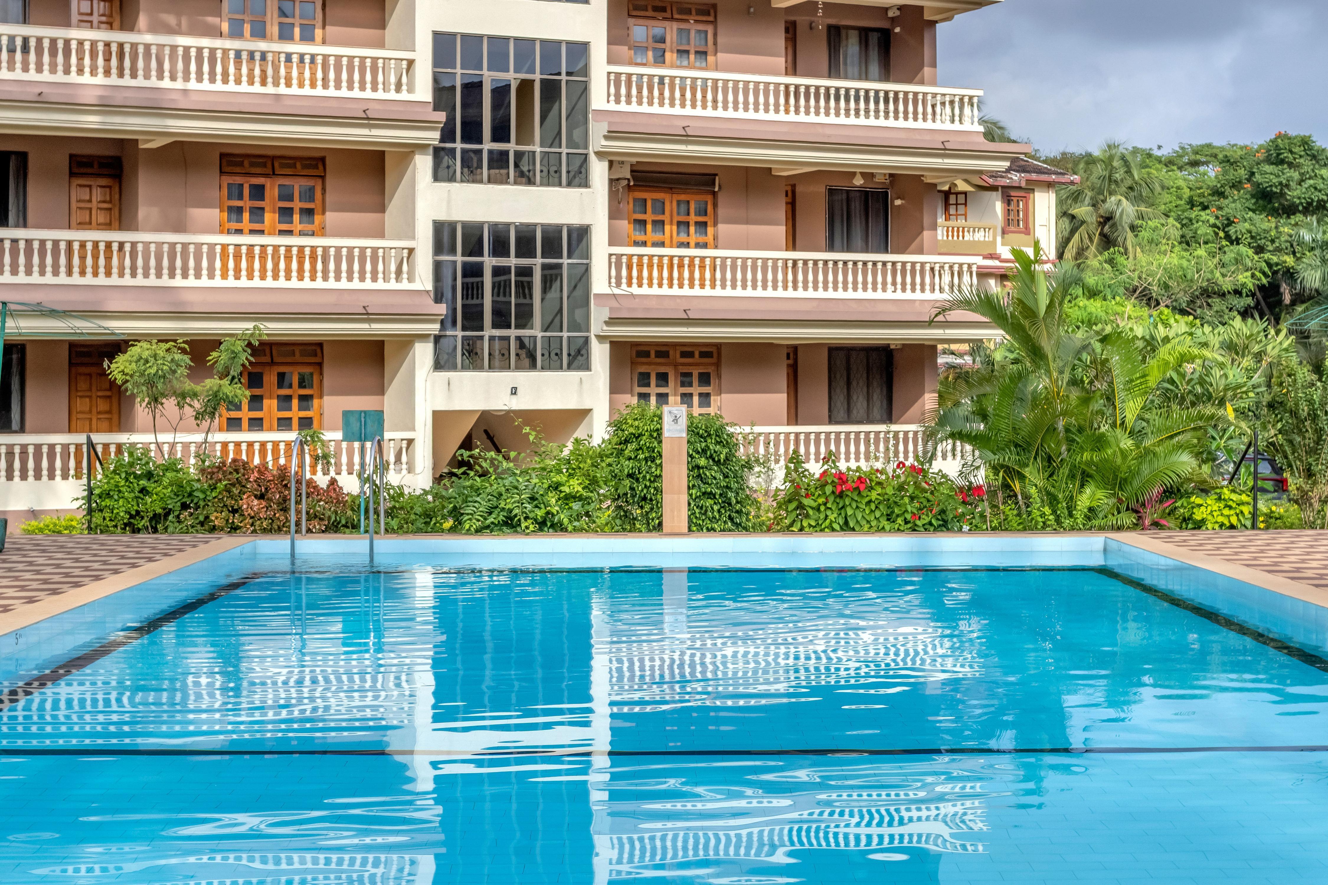 tisyastays | Marbella 2BHK at Regal Park with Pool, 5mins to beach - Tap to explore photos