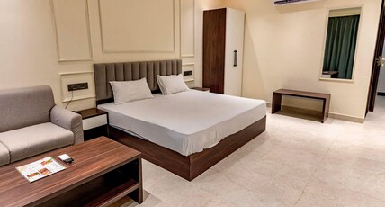 Swastik Stays Room Type - Deluxe Room with Balcony