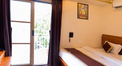 HOTEL VRAJRAJ PALACE Room Type - Deluxe Double Bed Room