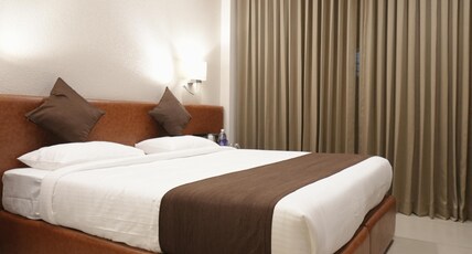 AS Suites | 5 Mins from Kakkanad Infopark Room Type - Deluxe Double Room with Balcony