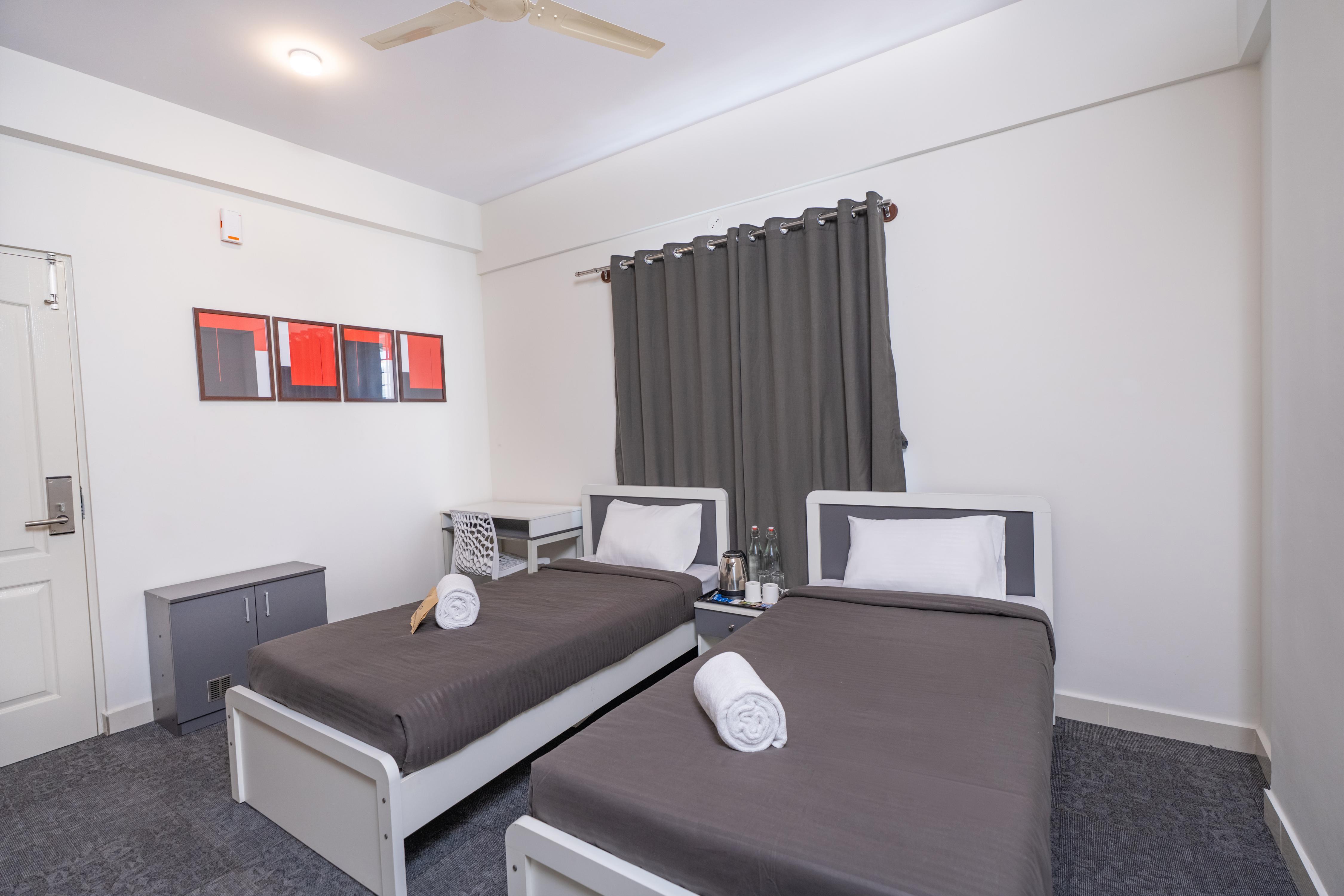 Loop by Zolo HSR Layout Room Type - Deluxe Twin Room | AC