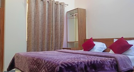 Ayanam Palace Room Type - Deluxe AC Room with Balcony