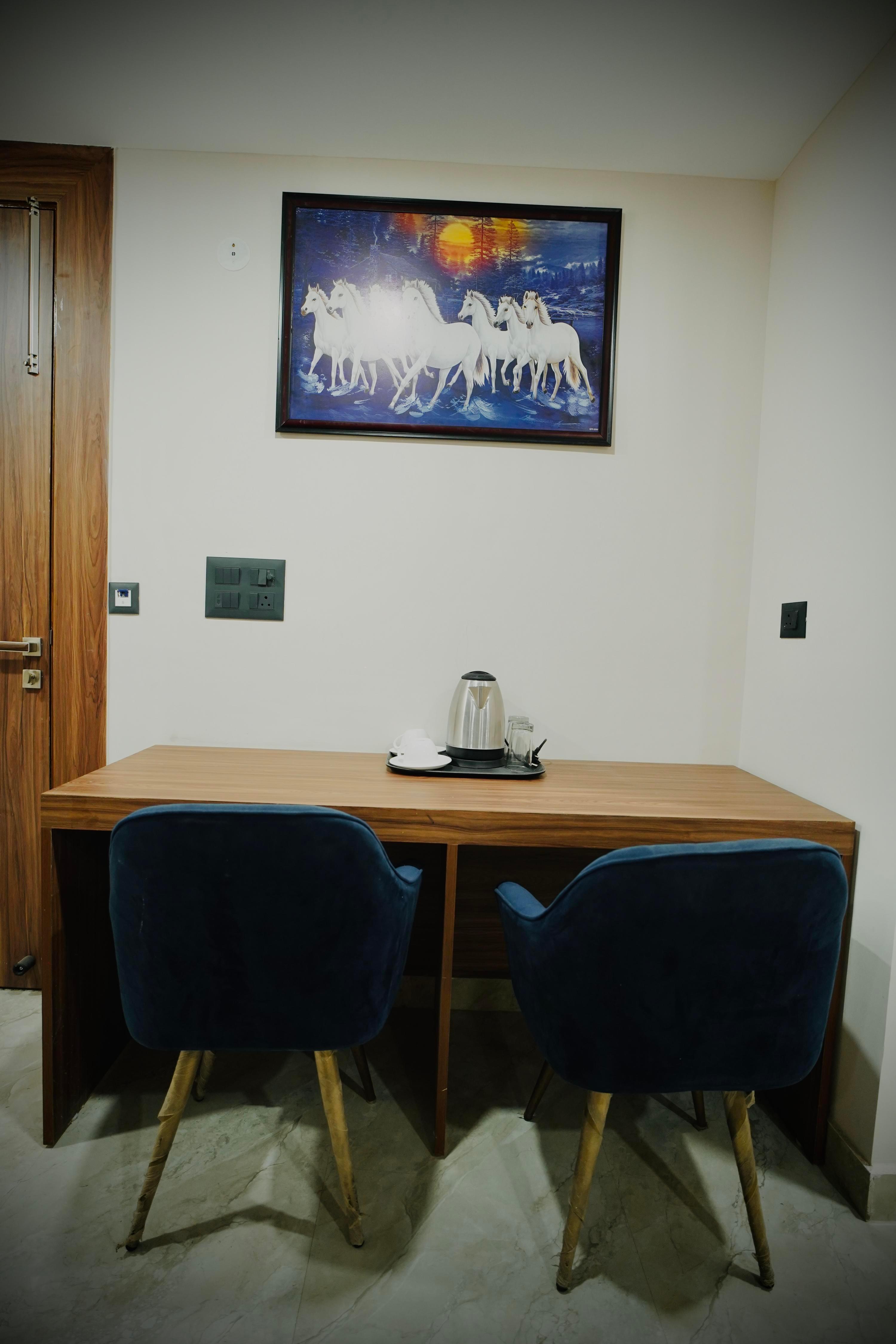 Hotel Divines Residency - Tap to explore photos