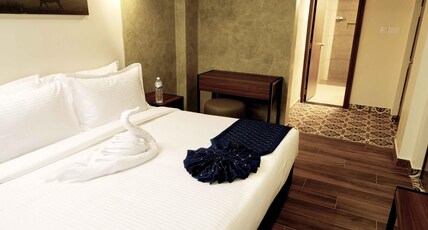 RIVER BAY ATHIRAPPILLY Room Type - Deluxe Family Room With Balcony