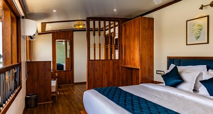 Kadavil Luxury Houseboat by Riverine Group Room Type - Premium Sharing Cruise (Full time Room AC) Kadavil Luxury Houseboat by Riverine Group Room Type - Premium Sharing Cruise (Full time Room AC)