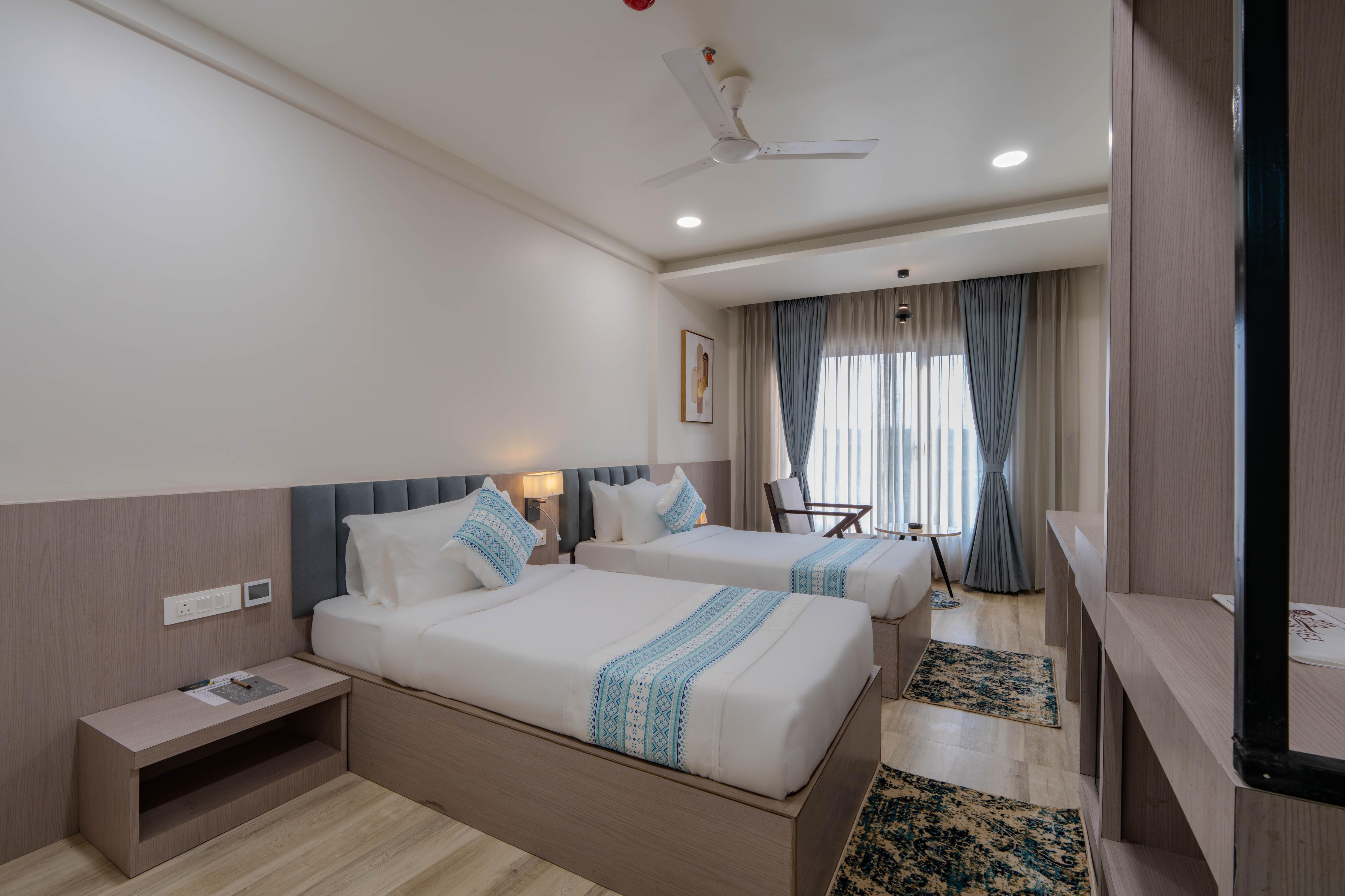 HOTEL TGR - Tap to explore photos