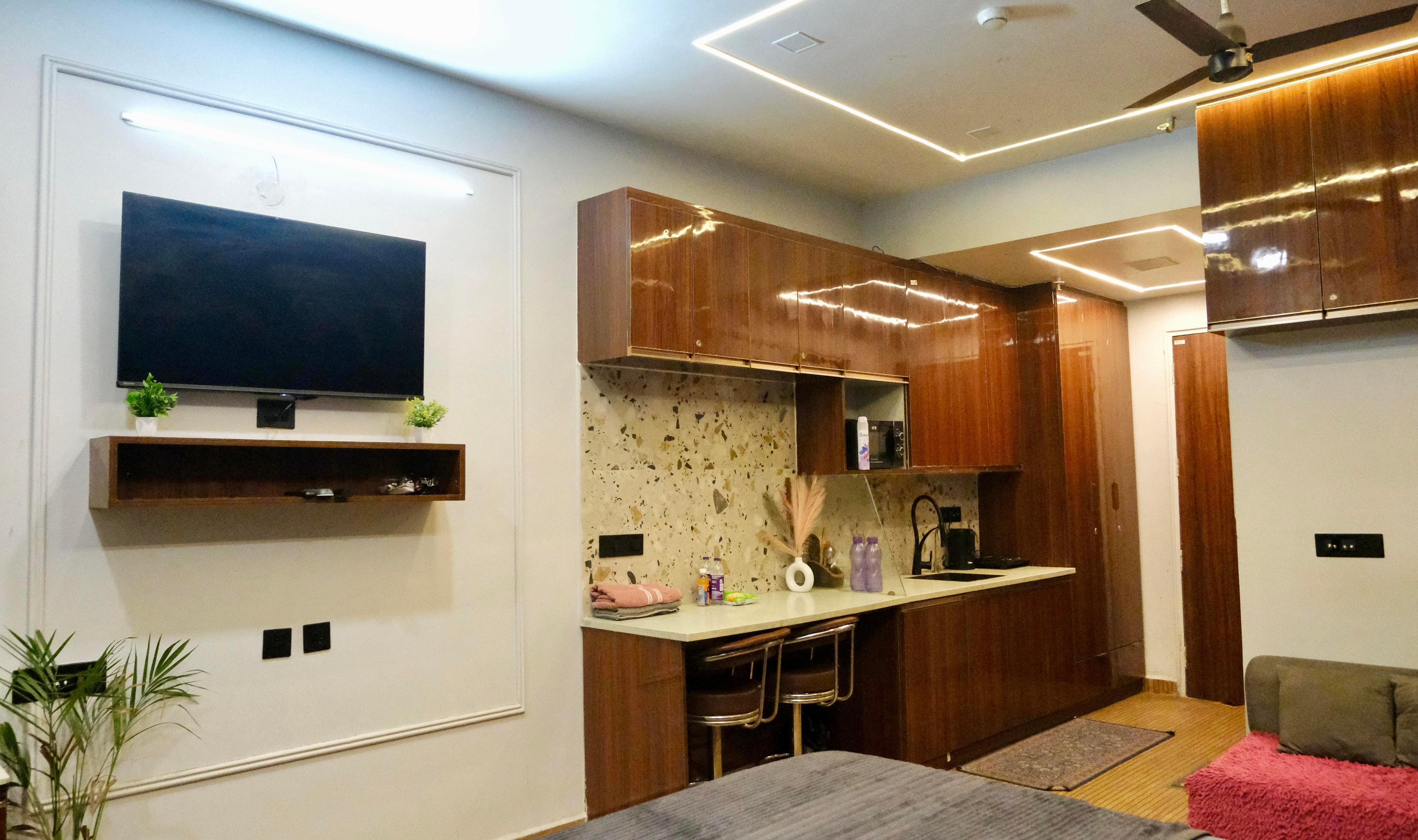 Couple-Friendly Studio Apartment in Gaur City Center - Tap to explore photos