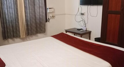 Sai heritage inn Room Type - Bedroom
