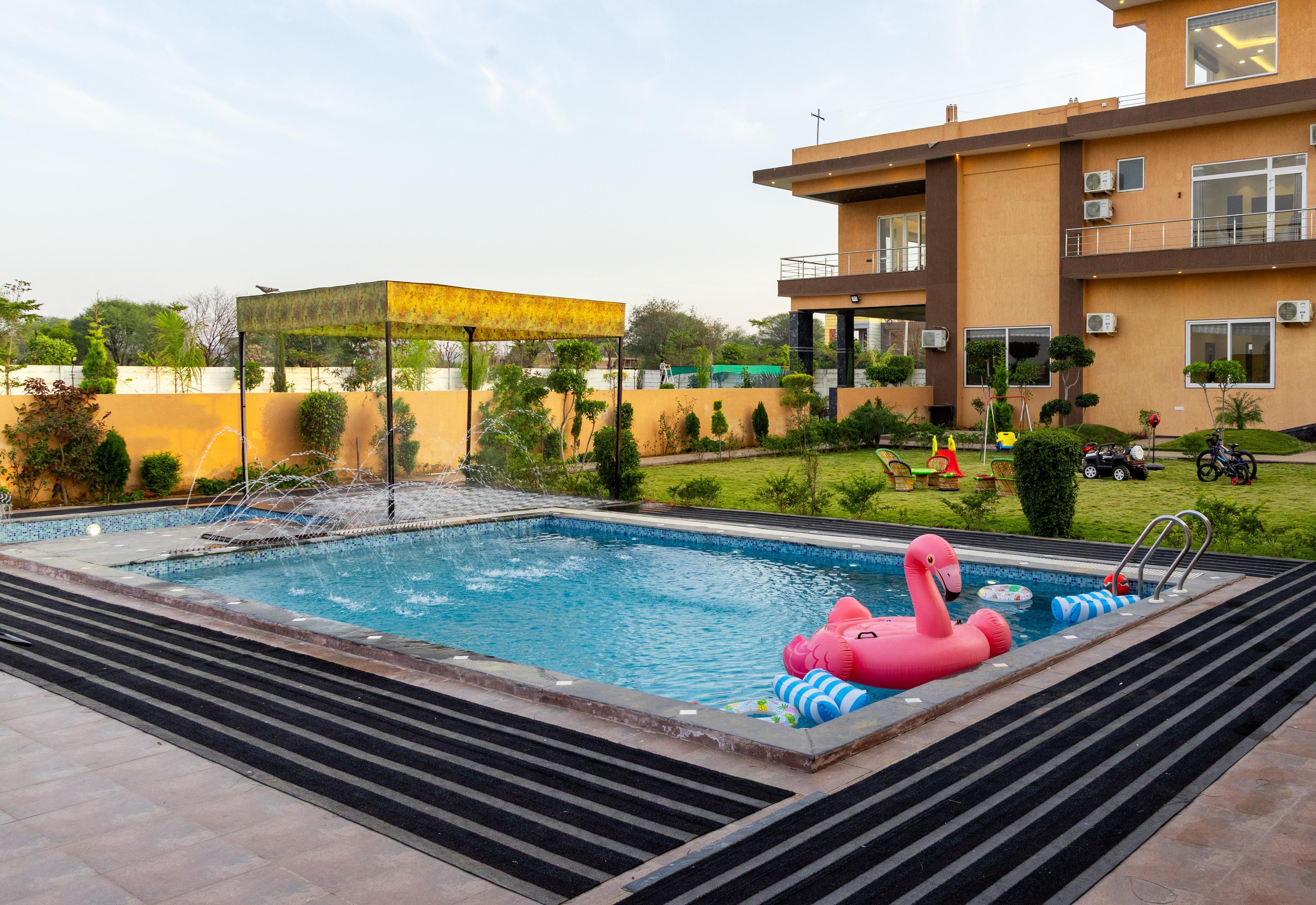 ELIVAAS Signature Abhinandan Farm 7 BHK Villa - Tap to explore photos