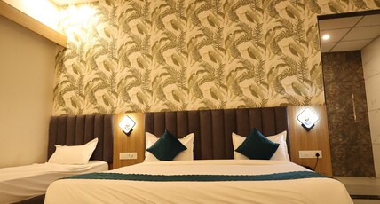 SHIVAM HOTEL Room Type - Deluxe Room SHIVAM HOTEL Room Type - Deluxe Room