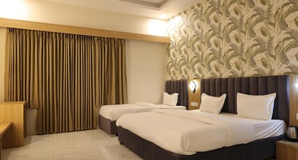 SHIVAM HOTEL Room Type - Deluxe Room