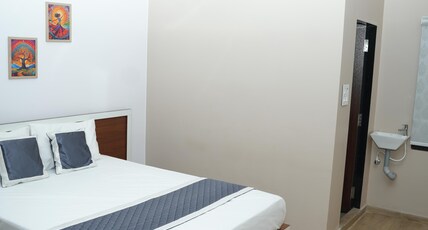 RAVI CONVENTION CENTRE Room Type - DELUXE ROOM