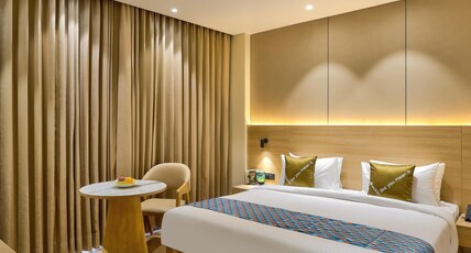 Palette Convention Hotel by CheckIn, Millennium City Gurugram Room Type - Premium King Room with Balcony