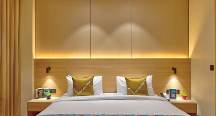 Palette Hotel & Convention Centre by CheckIn, Millennium City Gurugram Room Type - Premium King Room with Balcony