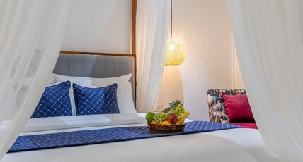 Aayovea Resort Ayodhya Near Ram Mandir & Saryu River Room Type - Deluxe Room with Balcony and Garden View (VIP Pass Assistance | Pure Veg Satvik Food | No Onion & No