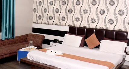HOTEL J P RESIDANCY Room Type - Super Deluxe Room