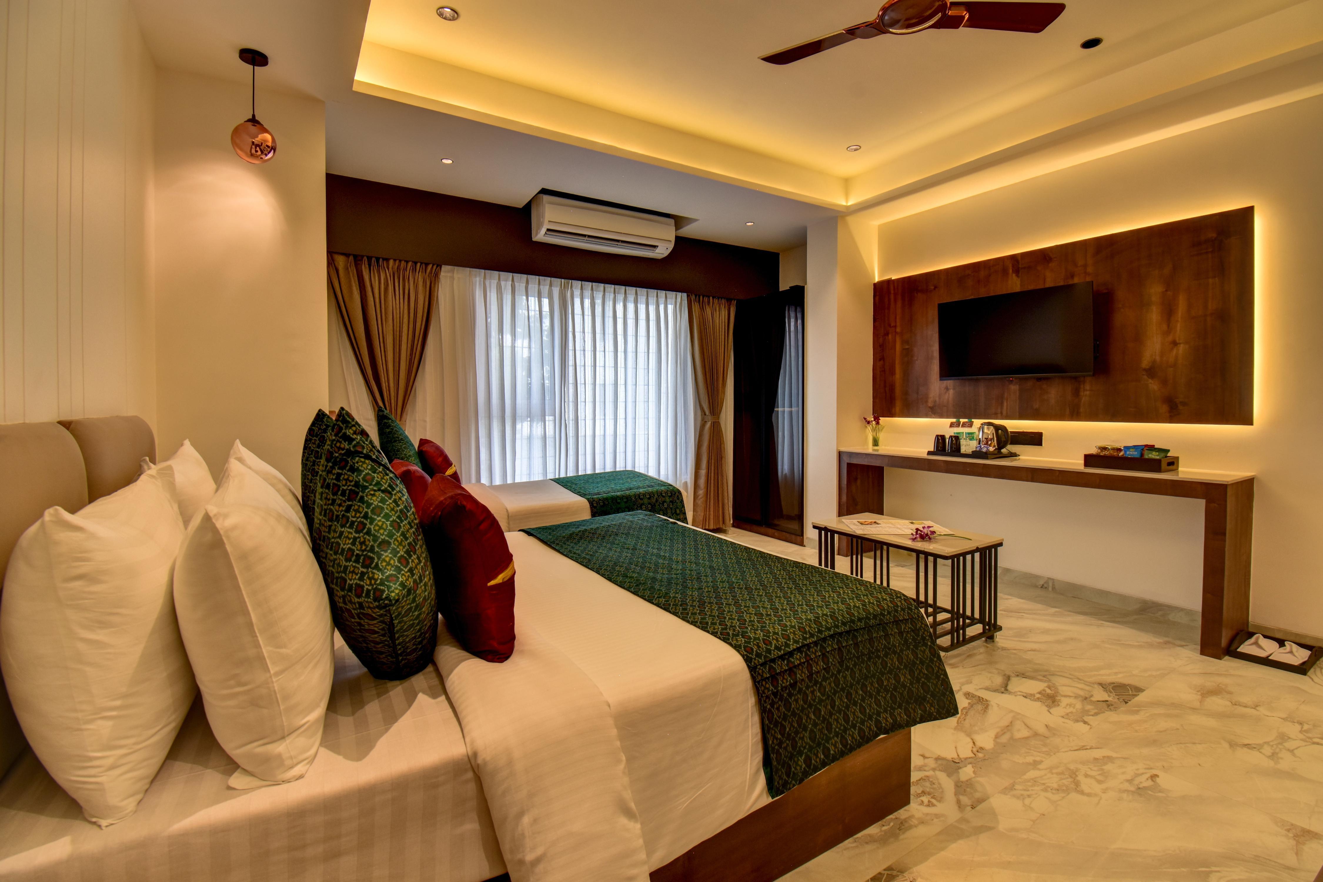 Hotel Orchid by Marigold, Shirdi - Premium Comfort Near Sai Baba Temple - Tap to explore photos