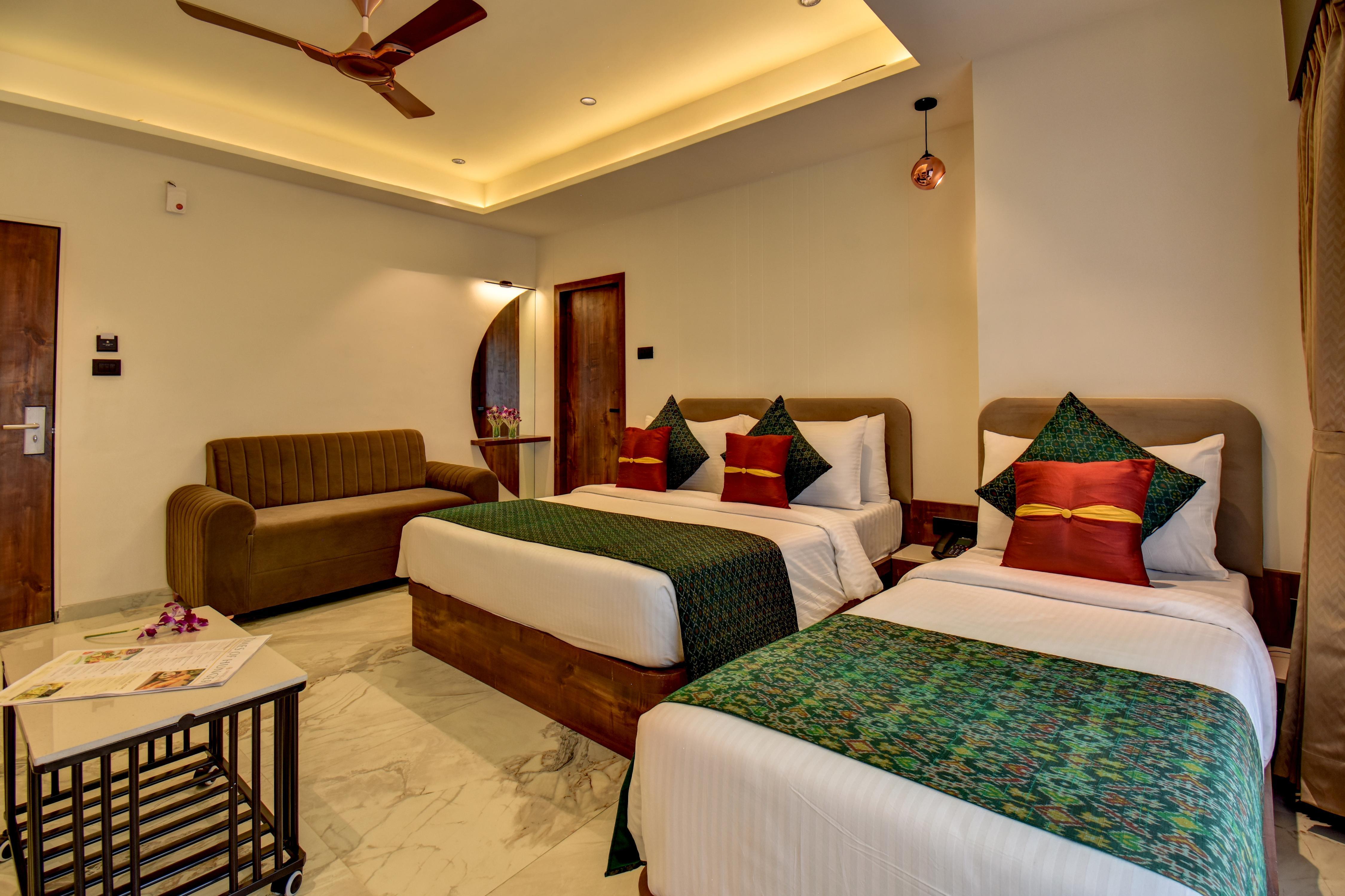 Hotel Orchid by Marigold, Shirdi - Premium Comfort Near Sai Baba Temple - Tap to explore photos