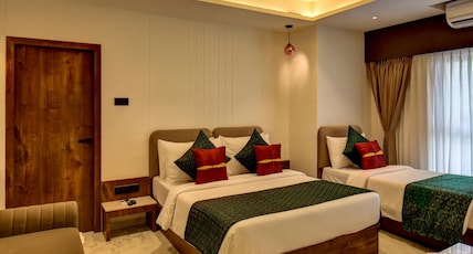 Hotel Orchid by Marigold, Shirdi - Premium Comfort Near Sai Baba Temple Room Type - Orchid Triple Room Hotel Orchid by Marigold, Shirdi - Premium Comfort Near Sai Baba Temple Room Type - Orchid Triple Room