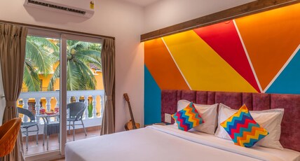 goSTOPS PLUS Goa Candolim Room Type - Deluxe Private AC Room with Balcony and Ensuite Bathroom