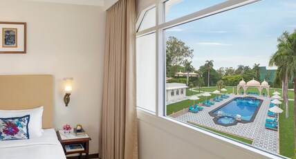 Tajview, Agra - IHCL SeleQtions Room Type - Deluxe Room Pool View King Bed with Shower Cubical Tajview, Agra - IHCL SeleQtions Room Type - Deluxe Room Pool View King Bed with Shower Cubical