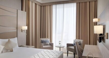 Two Seasons Hotel & Apartments  Room Type - One Bedroom Apartment with Sea View