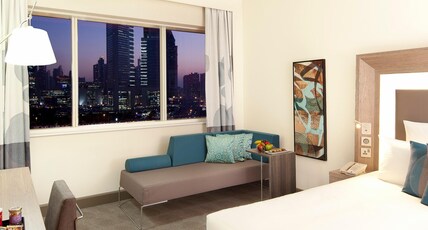 Novotel World Trade Centre Dubai Room Type - Executive Suite with Queen Bed and Sofa Novotel World Trade Centre Dubai Room Type - Executive Suite with Queen Bed and Sofa