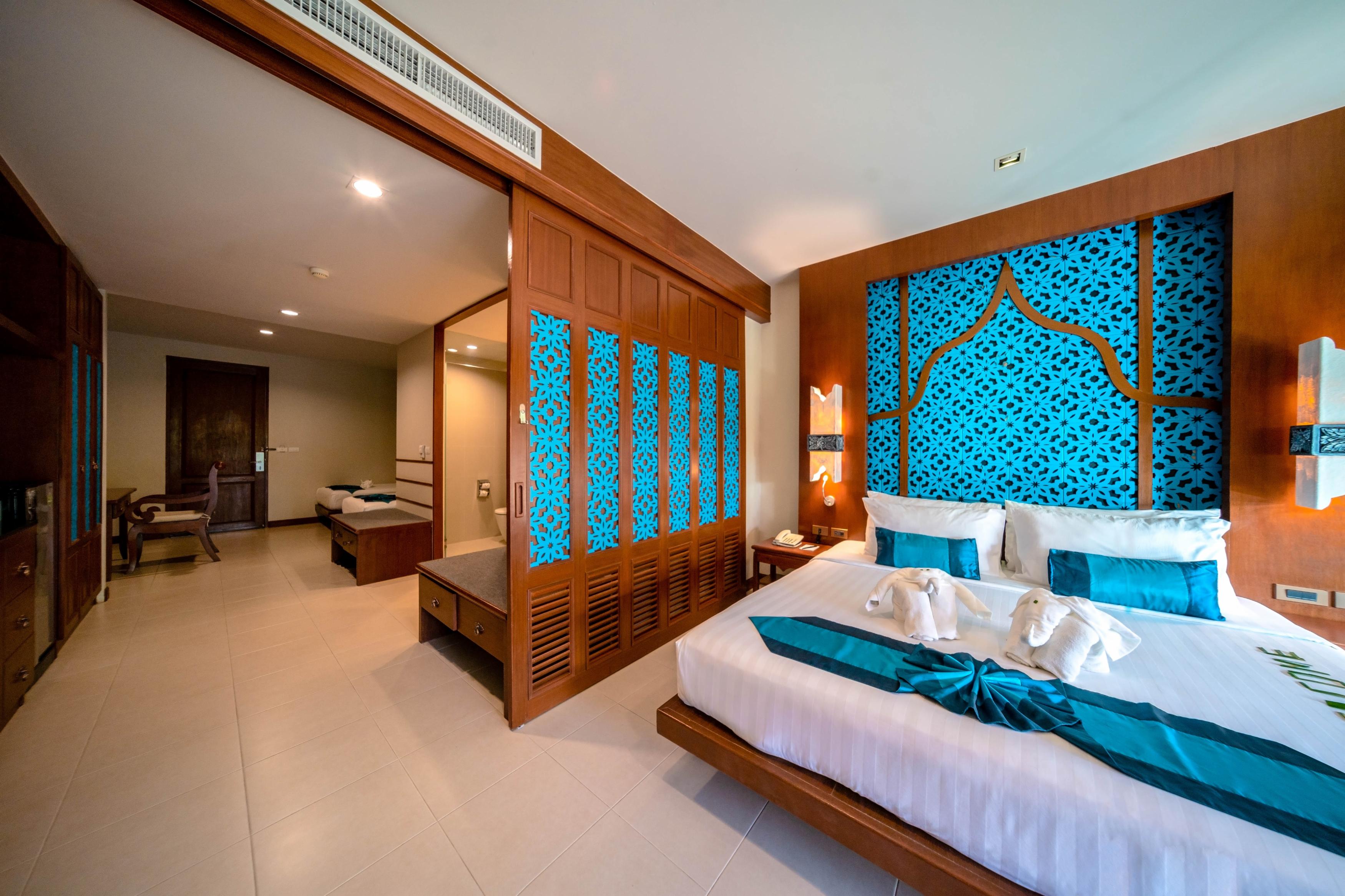Rawai Palm Beach Resort - Tap to explore photos